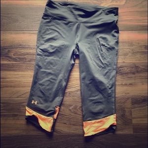 Gray and Orange Under Armour crops